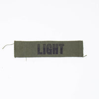 60s Vietnam War US Army 'Light' Subdued Stamped Name Tape